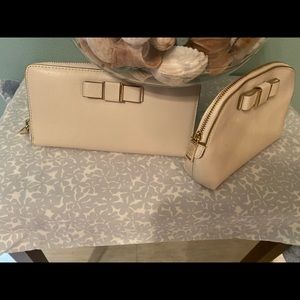 Coach Leather Wallet and Cosmetic Case cream colored with cute bow logo